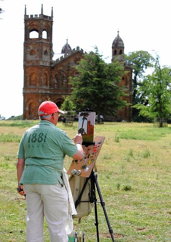 Peter Baker painting on location near the Gothic Temple in the Stowe National Trust Landscape Gardens